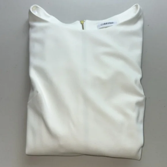 Elegant Calvin Klein White Dress with Flared Sleeves. - Picture 15 of 15